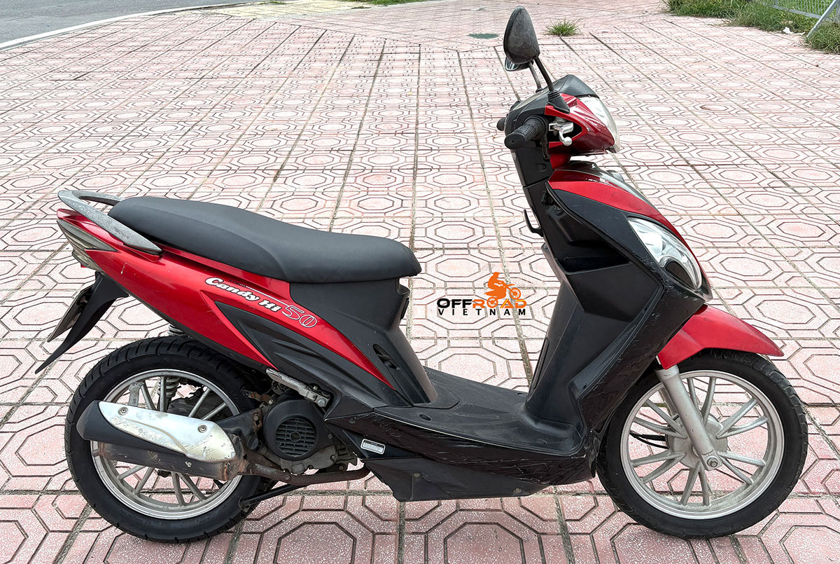 Offroad Vietnam Motorbike Adventures - Rent 50cc Motorbikes & Scooters Rentals In Hanoi. Offroad Vietnam provides moped scooter tours and rentals in Hanoi. This is a 2014 red Kymco Candy Hi automatic scooter 50cc from right
