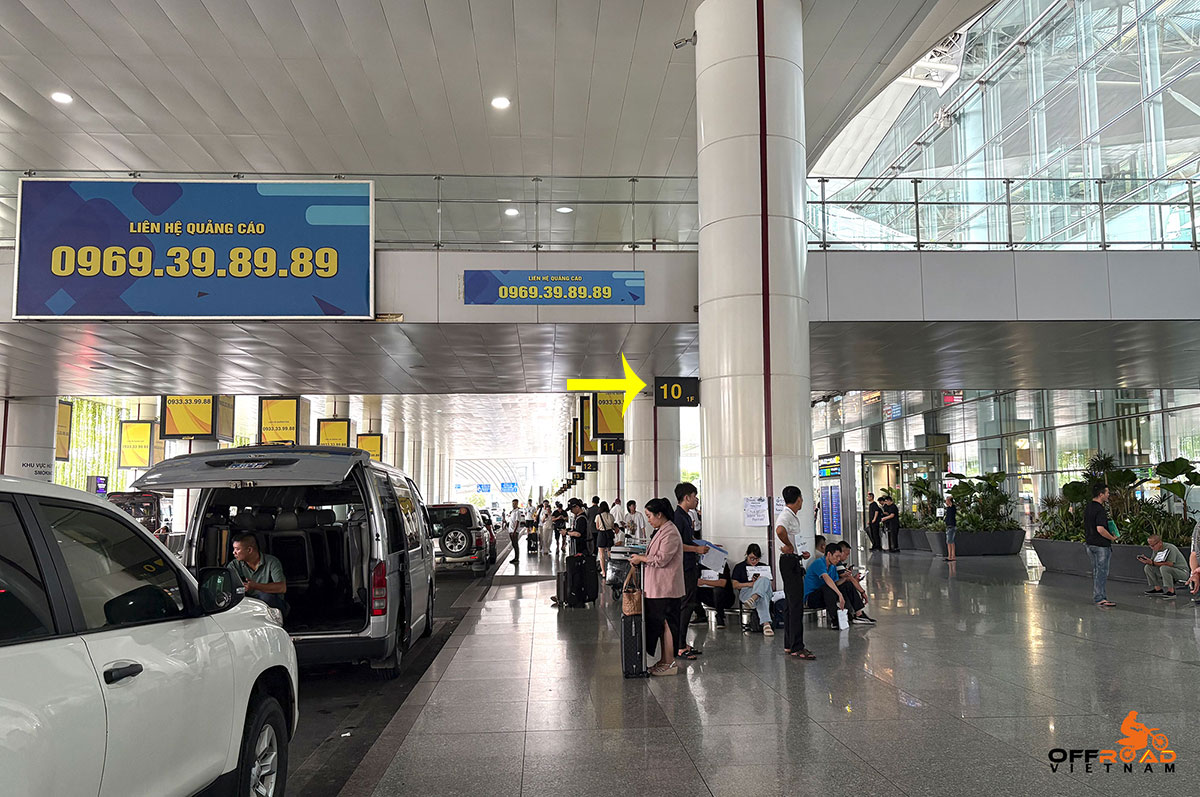Offroad Vietnam Motorbike Adventures - Airport Transfers In Hanoi: Meeting point pillar number 10 at Hanoi's Noi Bai international airport in Vietnam.