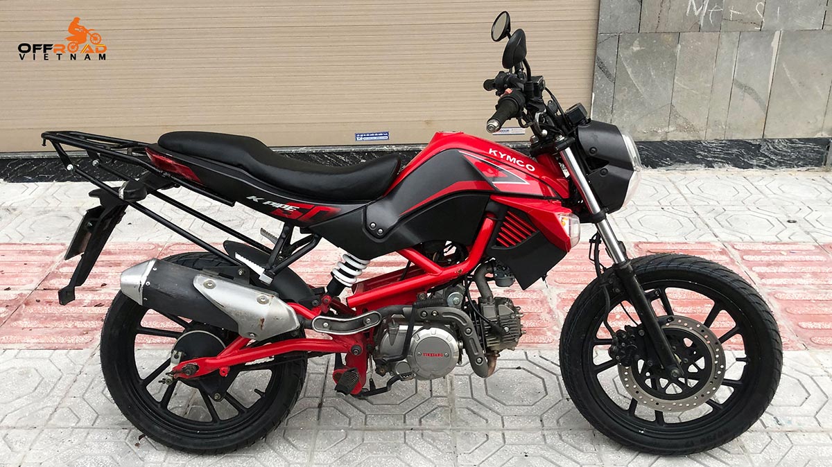 Offroad Vietnam Motorbike Adventures - Rent 50cc Motorbikes & Scooters Rentals In Hanoi. Offroad Vietnam provides moped scooter tours and rentals in Hanoi. This is a 2020 black/red KYMCO K-Pipe semi-automatic motorbike 50cc from right